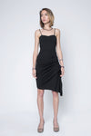 Strappy midi black dress with side rouge and asymmetric bottom.