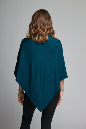 Ultra soft and lightweight one size asymmetrical poncho sweater wrap.