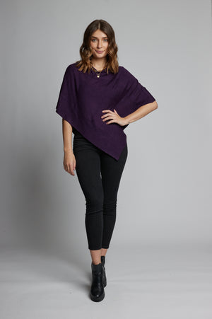 Ultra soft and lightweight one size asymmetrical poncho sweater wrap.