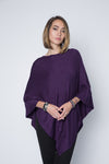Ultra soft and lightweight one size asymmetrical poncho sweater wrap.
