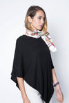 Asymmetrical black poncho sweater wrap.